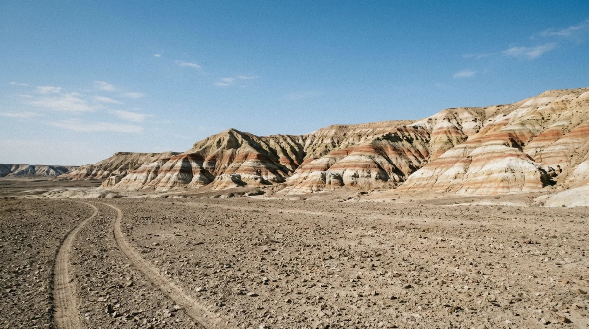Red and white layered hills at Kyzylkup, the Tiramisu formation visited on day five of the 6-day Mangystau tour from Aktau